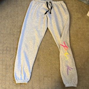 small pink “victoria secret” sweatpants